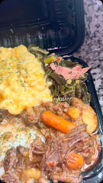 Soul food platter with pot roast and collard greens